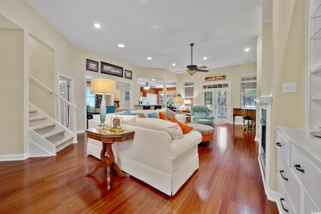 4803 Bucks Bluff Dr, North Myrtle Beach, SC 29582 - living room with ceiling fan, recessed lighting, wood finished floors, stairs, and a fireplace