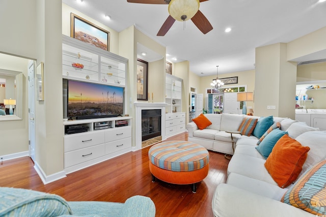 4803 Bucks Bluff Dr, North Myrtle Beach, SC 29582 - living area with washer and clothes dryer, hardwood / wood-style floors, a ceiling fan, a fireplace, and recessed lighting