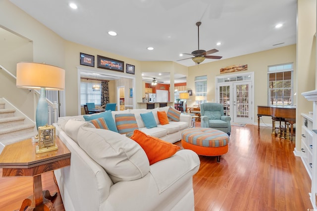 4803 Bucks Bluff Dr, North Myrtle Beach, SC 29582 - living room with healthy amount of natural light, light wood-style floors, ceiling fan, stairway, and recessed lighting
