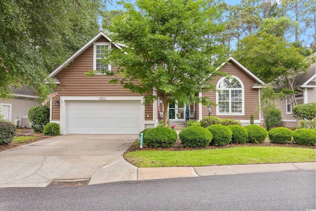 4803 Bucks Bluff Dr, North Myrtle Beach, SC 29582 - view of front of home with driveway and a garage