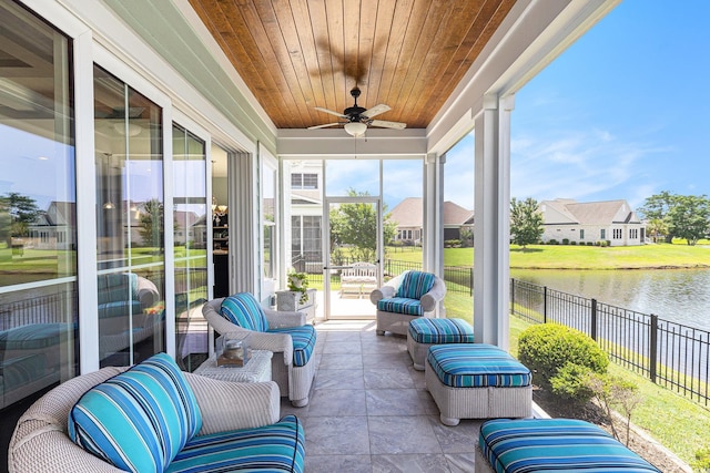5032 Middleton View Dr, Myrtle Beach, SC 29579 - sunroom with ceiling fan, a water view, and a residential view