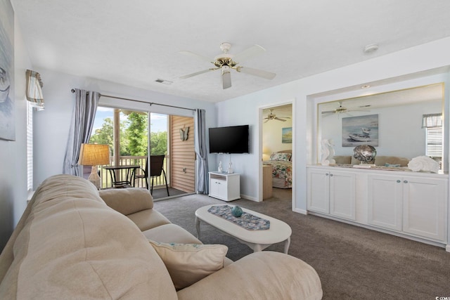 633 Waterway Village Blvd Unit 11D, Myrtle Beach, SC 29579 - carpeted living area with a ceiling fan and baseboards