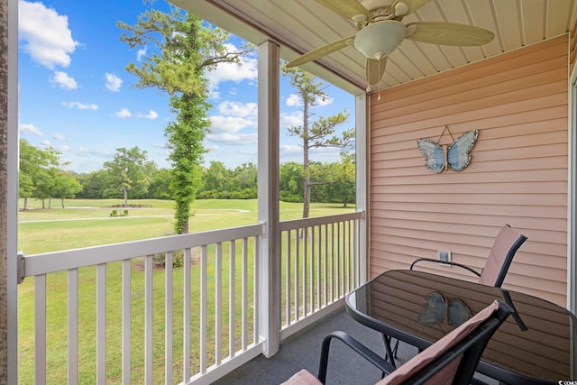 633 Waterway Village Blvd Unit 11D, Myrtle Beach, SC 29579 - balcony featuring a ceiling fan and view of wooded area