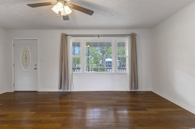 2519 Reta St, Conway, SC 29526 - foyer entrance with a textured ceiling, hardwood / wood-style floors, ceiling fan, and baseboards