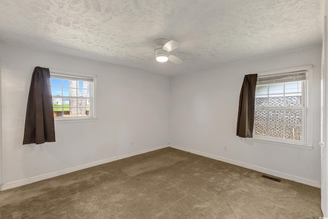 2519 Reta St, Conway, SC 29526 - empty room featuring carpet flooring, a textured ceiling, baseboards, and ceiling fan
