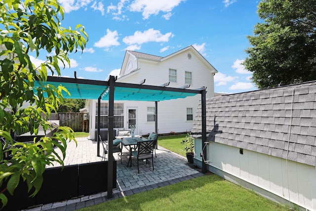 867 Cardinal Pl, North Myrtle Beach, SC 29582 - back of house featuring a patio area and a shingled roof