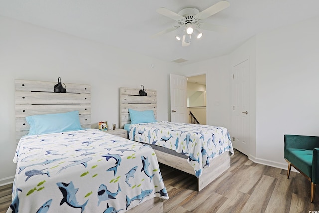 867 Cardinal Pl, North Myrtle Beach, SC 29582 - bedroom featuring wood finished floors, baseboards, and a ceiling fan