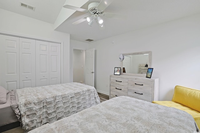 867 Cardinal Pl, North Myrtle Beach, SC 29582 - bedroom with a closet, wood finished floors, ceiling fan, and baseboards