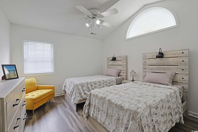 867 Cardinal Pl, North Myrtle Beach, SC 29582 - bedroom featuring wood finished floors, lofted ceiling, ceiling fan, and baseboards
