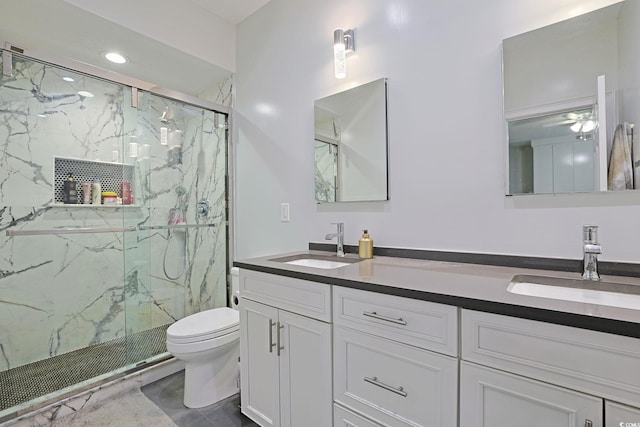 867 Cardinal Pl, North Myrtle Beach, SC 29582 - full bathroom featuring toilet, a marble finish shower, double vanity, ceiling fan, and recessed lighting