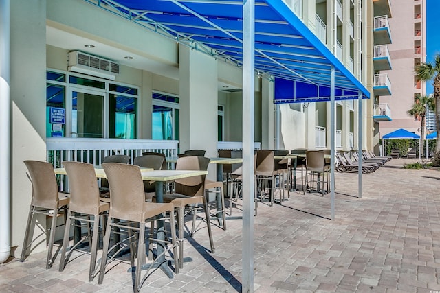 view of patio / terrace featuring an outdoor bar