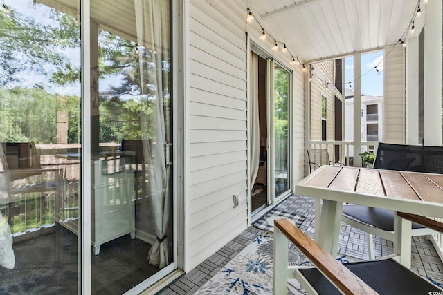sunroom with track lighting