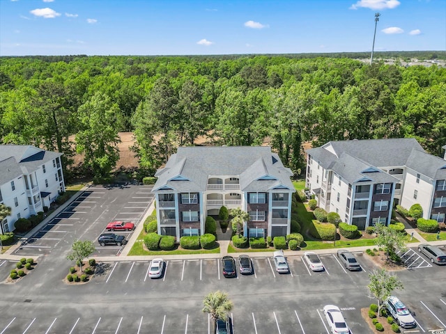 drone / aerial view of a heavily wooded area