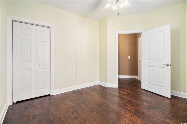 189 Ella Kinley Cir Unit 201, Myrtle Beach, SC 29588 - unfurnished bedroom with dark wood finished floors, baseboards, ceiling fan, and a closet