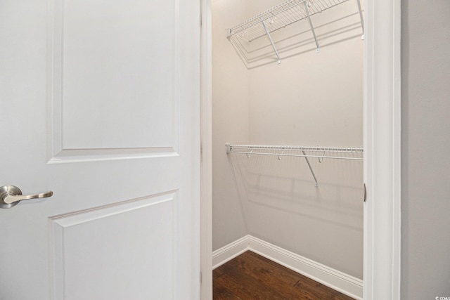 189 Ella Kinley Cir Unit 201, Myrtle Beach, SC 29588 - walk in closet featuring dark wood finished floors
