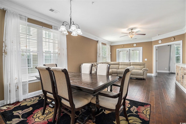 189 Ella Kinley Cir Unit 201, Myrtle Beach, SC 29588 - dining area with baseboards, dark wood finished floors, ceiling fan, crown molding, and a chandelier
