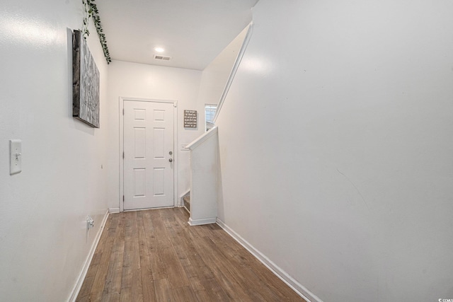 2059 Borgata Loop, Longs, SC 29568 - doorway to outside featuring baseboards, wood finished floors, and stairs
