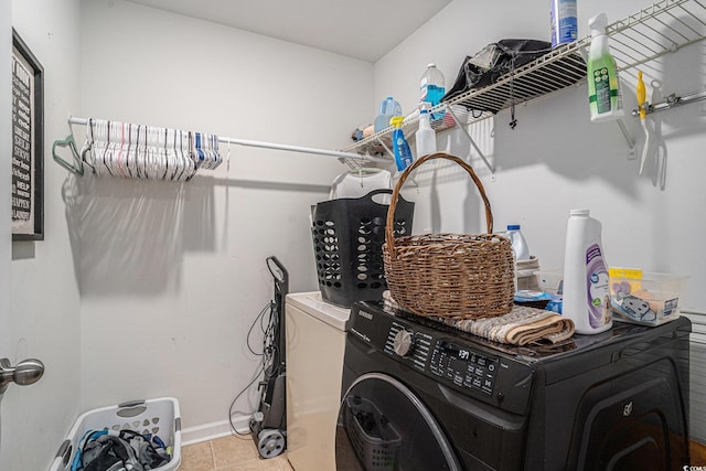 2059 Borgata Loop, Longs, SC 29568 - clothes washing area featuring washer / clothes dryer, light tile patterned flooring, and baseboards