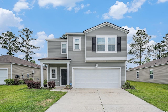 traditional-style house featuring a garage, a front lawn, and concrete driveway