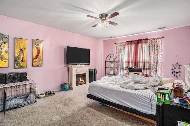 2059 Borgata Loop, Longs, SC 29568 - carpeted bedroom with ceiling fan, a lit fireplace, and baseboards