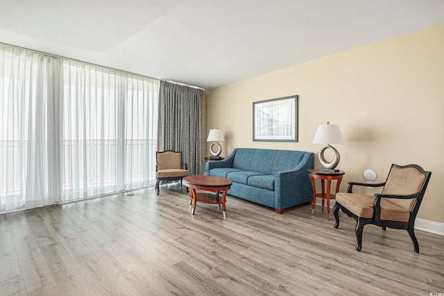 201 S Ocean Blvd Unit 1112, Myrtle Beach, SC 29577 - living area with wood finished floors and baseboards