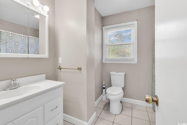 3001 Wiley Dr, North Myrtle Beach, SC 29582 - bathroom featuring vanity, toilet, tile patterned flooring, and baseboards
