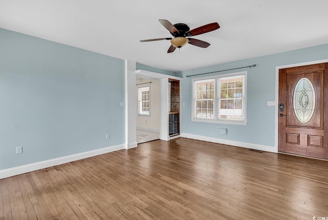 3001 Wiley Dr, North Myrtle Beach, SC 29582 - foyer with ceiling fan, wood-type flooring, baseboards, and a fireplace