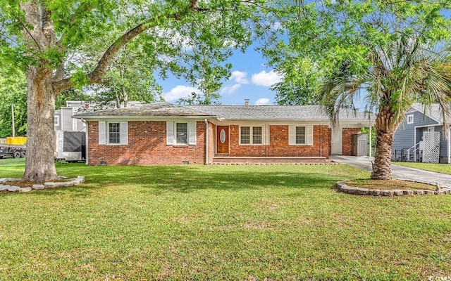 3001 Wiley Dr, North Myrtle Beach, SC 29582 - ranch-style home featuring driveway, a front yard, brick siding, an attached carport, and crawl space