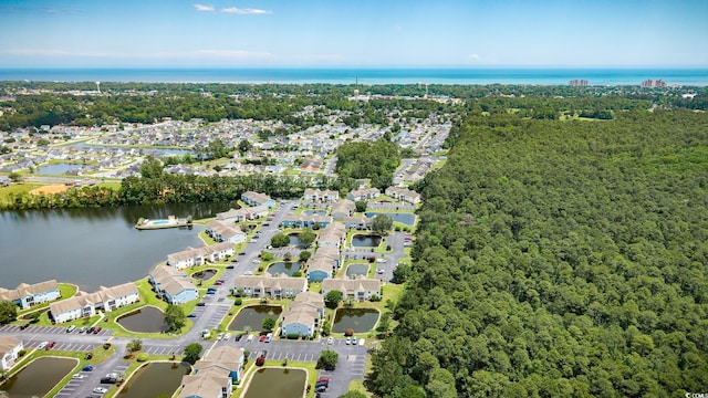 8925 Duckview Dr Unit A, Surfside Beach, SC 29575 - aerial view of property and surrounding area featuring a nearby body of water, nearby suburban area, and a forest