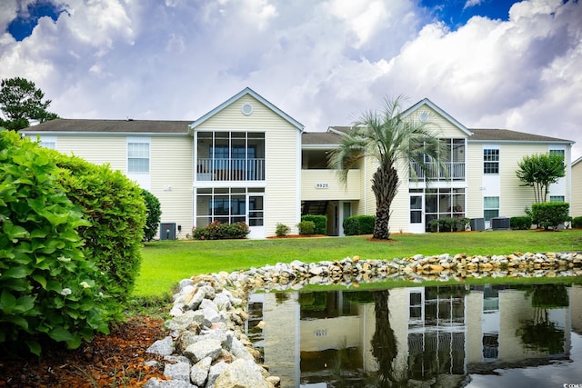 8925 Duckview Dr Unit A, Surfside Beach, SC 29575 - view of building exterior with central AC unit