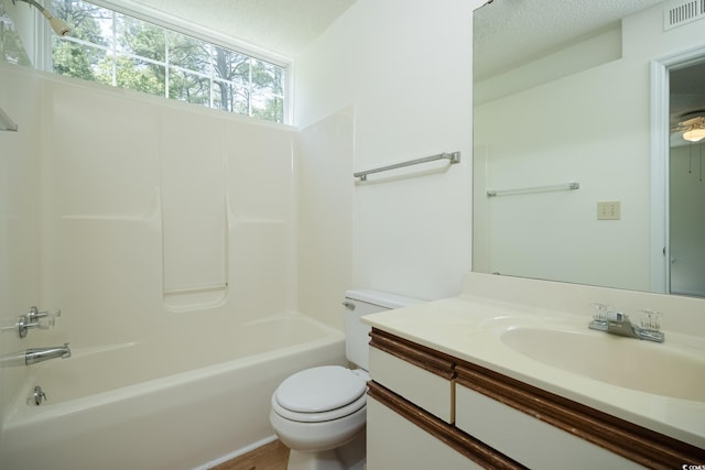 8925 Duckview Dr Unit A, Surfside Beach, SC 29575 - bathroom featuring toilet, vanity, bathtub / shower combination, and wood finished floors