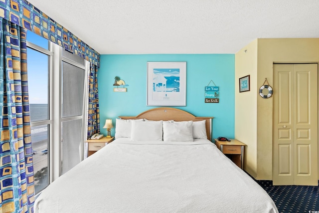 bedroom featuring a textured ceiling
