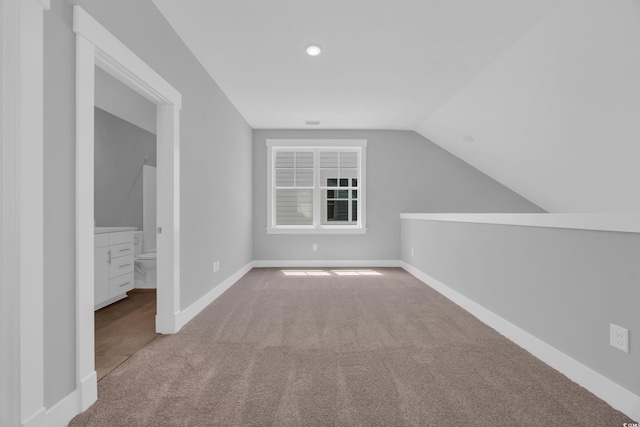 1961 Indigo Cove Ln, Calabash, NC 28467 - additional living space with carpet, lofted ceiling, baseboards, and recessed lighting