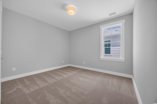 1961 Indigo Cove Ln, Calabash, NC 28467 - unfurnished room featuring carpet flooring and baseboards