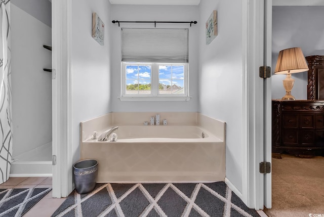 bathroom featuring a garden tub