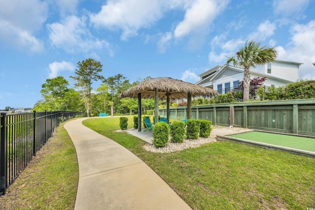 surrounding community featuring a game area and a gazebo