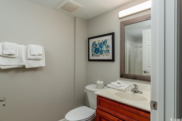1903 S Ocean Blvd S Unit 808, North Myrtle Beach, SC 29582 - full bathroom with an enclosed shower, vanity, and toilet