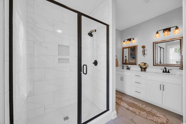 full bathroom with a stall shower and double vanity