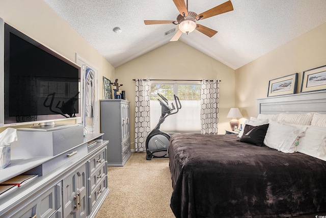 bedroom featuring vaulted ceiling, light colored carpet, a textured ceiling, and a ceiling fan