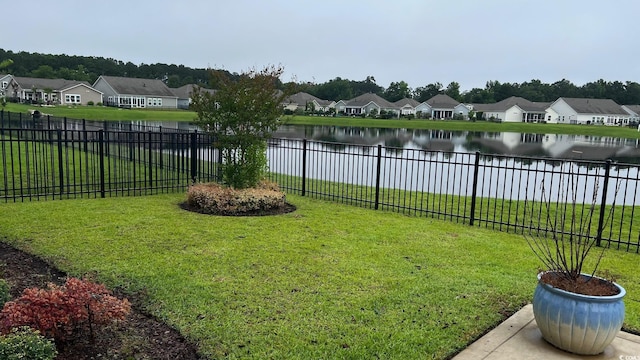 692 Cherry Blossom Dr, Murrells Inlet, SC 29576 - view of yard featuring a residential view and a water view