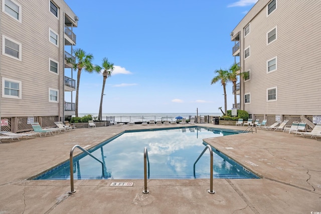 1310 N Waccamaw Dr Unit 204, Garden City Beach, SC 29576 - community pool with a patio area