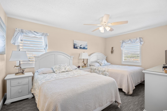 3805 S Ocean Blvd # 503, North Myrtle Beach, SC 29582 - bedroom with dark carpet and ceiling fan