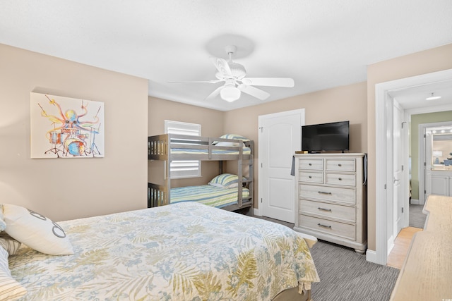 3805 S Ocean Blvd # 503, North Myrtle Beach, SC 29582 - bedroom with carpet flooring, a ceiling fan, and baseboards