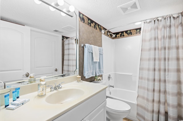 3805 S Ocean Blvd # 503, North Myrtle Beach, SC 29582 - bathroom featuring a textured ceiling, vanity, toilet, and shower / bath combination with curtain