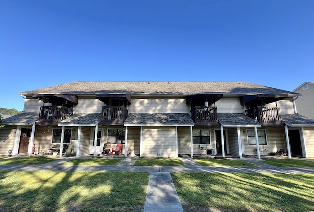 755 Burcale Rd Unit G4, Myrtle Beach, SC 29579 - view of property featuring a balcony, a front yard, and a patio area