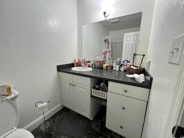 755 Burcale Rd Unit G4, Myrtle Beach, SC 29579 - bathroom with vanity, curtained shower, toilet, baseboards, and a textured wall