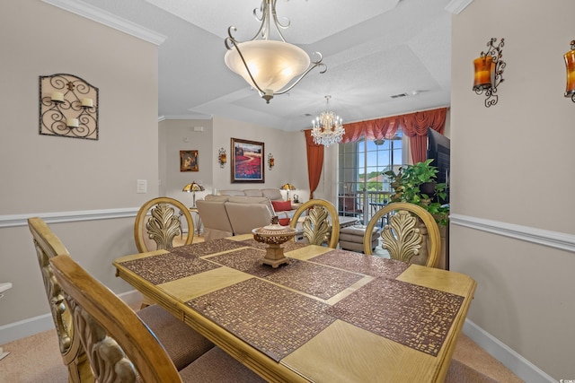 2241 Waterview Dr Unit 537, North Myrtle Beach, SC 29582 - dining room featuring a chandelier, carpet floors, baseboards, and crown molding