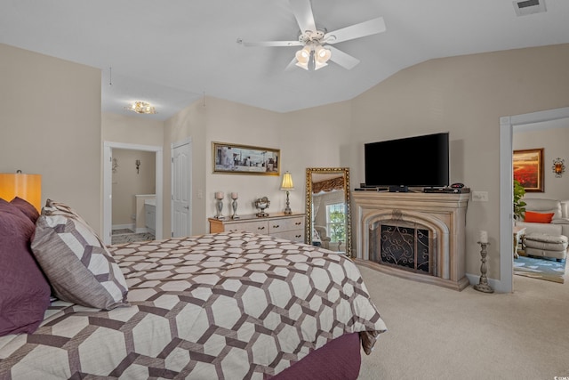 2241 Waterview Dr Unit 537, North Myrtle Beach, SC 29582 - bedroom featuring vaulted ceiling, carpet flooring, connected bathroom, a fireplace, and a ceiling fan