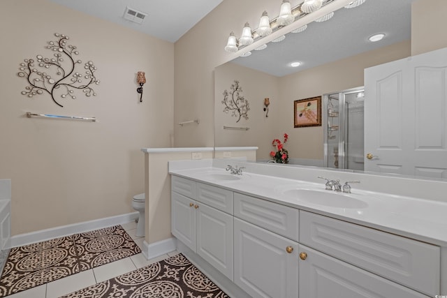 2241 Waterview Dr Unit 537, North Myrtle Beach, SC 29582 - full bathroom with tile patterned flooring, a stall shower, double vanity, toilet, and baseboards