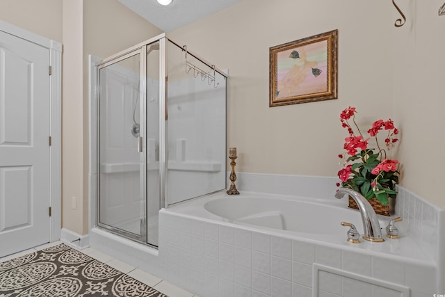 2241 Waterview Dr Unit 537, North Myrtle Beach, SC 29582 - full bathroom featuring a stall shower, a bath, and tile patterned floors